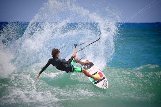 Person Riding Surf Board